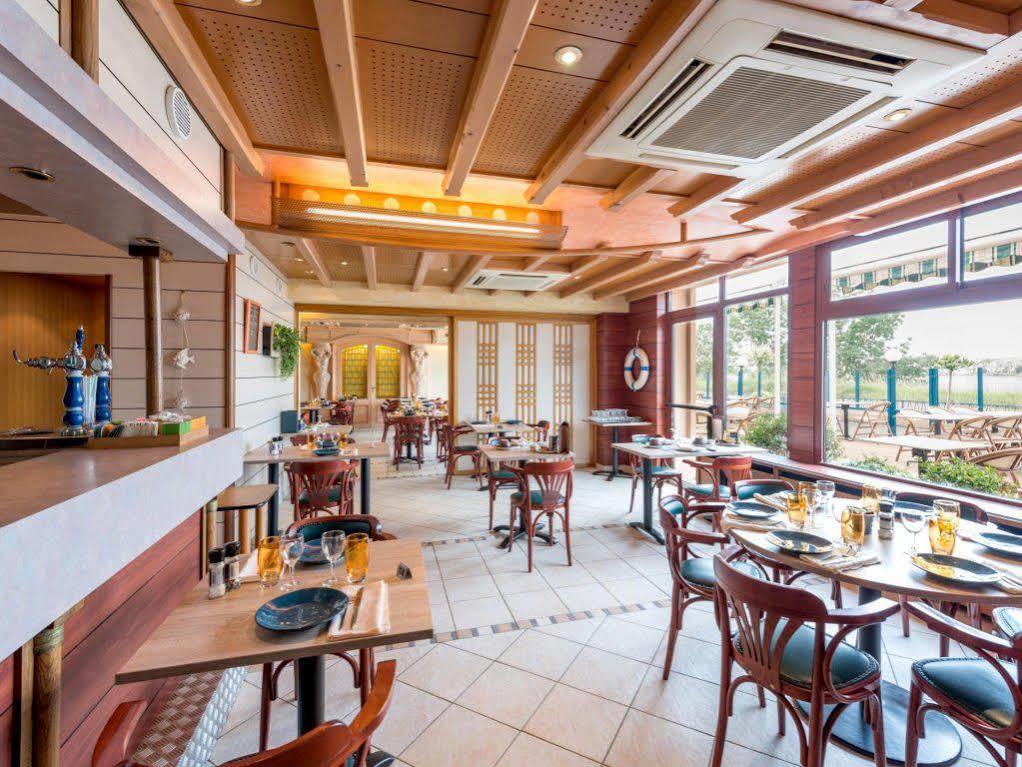 Logis Hotels - Au Poisson D'Argent - Hotel 3 Etoiles Et Restaurant Le Mesnil-en-Vallee Ngoại thất bức ảnh